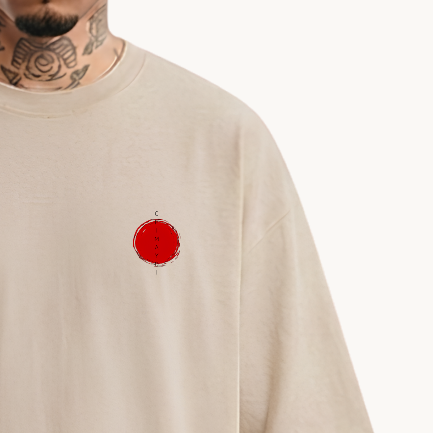 Close-up chest detail of CHIMAYOI beige tee with vertical logo and red Hinomaru sun design