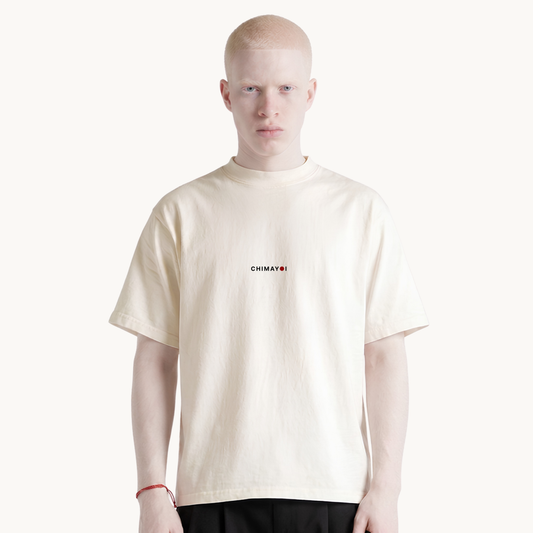 CHIMAYOI Embroidered Heavyweight Cropped Tee in off-white, front view on male model showcasing minimalist logo and structured drape