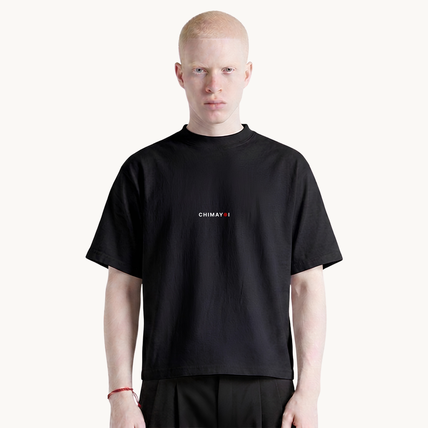 CHIMAYOI Embroidered Heavyweight Cropped Tee in Black, front view on male model featuring signature minimalist center logo.